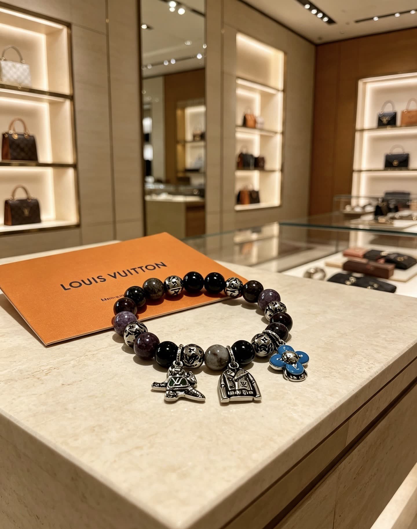 Louis Vuitton Beaded Bracelet with Charms